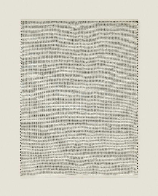 FLECKED RUG